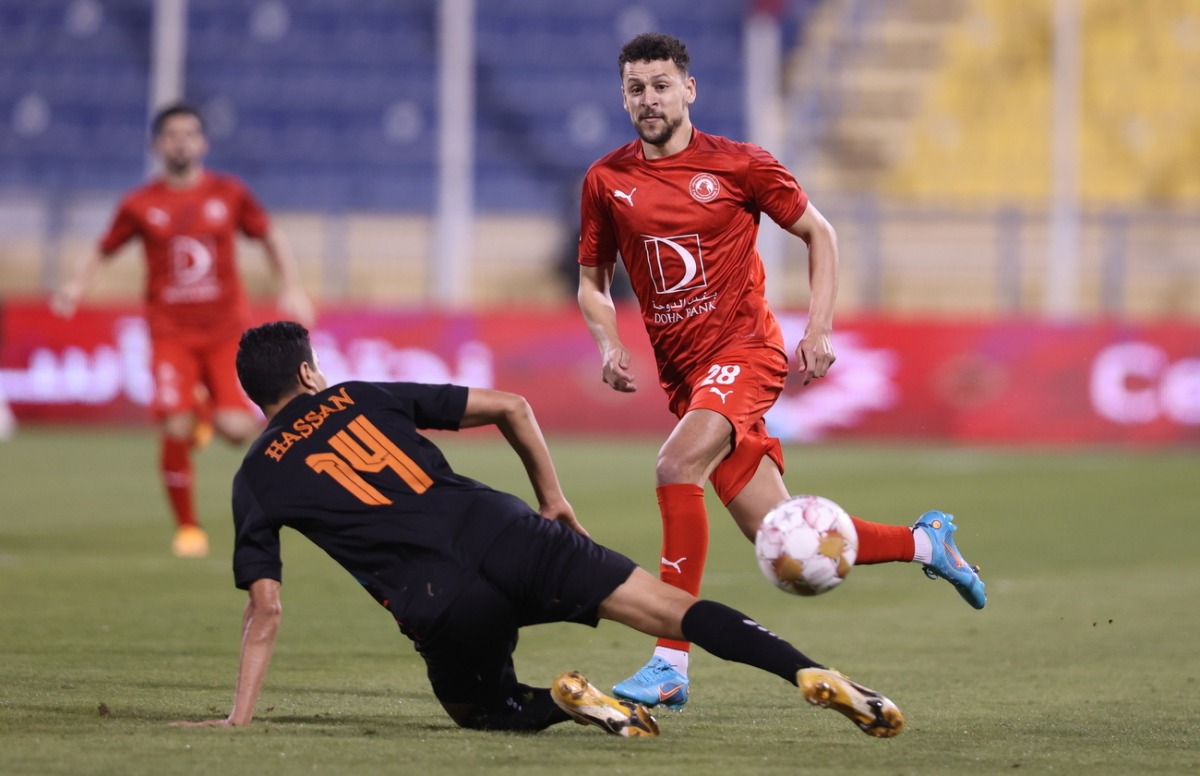 Al Arabi’s Youssef Msakni in action against an Umm Salal player, yesterday. 