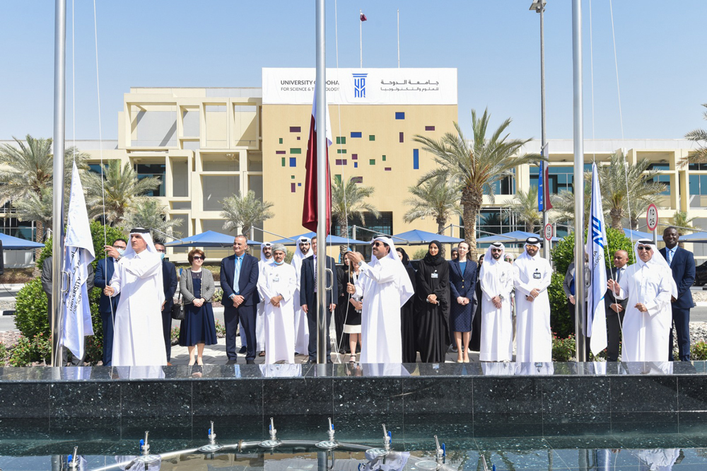 H E Dr. Mohammed bin Saleh Al Sada, Chairman of UDST’s Board of Trustees, and other officials at the flag raising ceremony. 