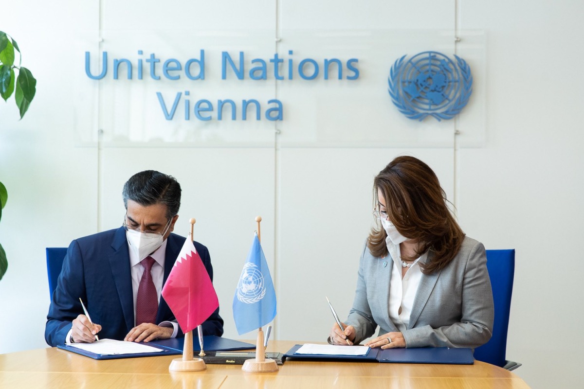 Minister of Labour H E Dr. Ali bin Smaikh Al Marri and Executive Director of the Vienna-based UNODC H E Ghada Waly signing the declaration.