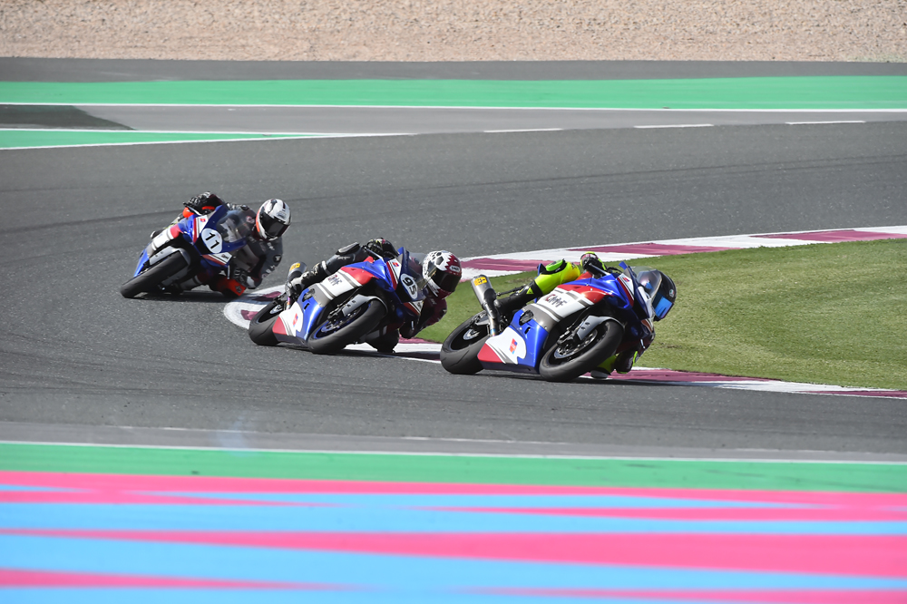 Abdulla Al Qubaisi,  Mashel Al Naimi And Saeed Al Sulaiti in action.