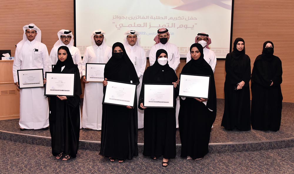 QU President Dr. Hassan Al Derham, Vice-President for Student Affairs Dr. Iman Mostafawi and other officials with the award-winning students. 