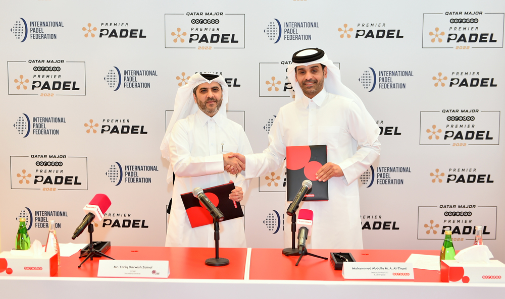 Ooredoo Chief Executive Officer Sheikh Mohammed bin Abdulla Al Thani and Qatar Tennis, Squash and Badminton Federation Secretary General and Tournament Director Tariq Zainal shake hands during the sponsorship-signing ceremony, yesterday. Picture: Abdul Basit