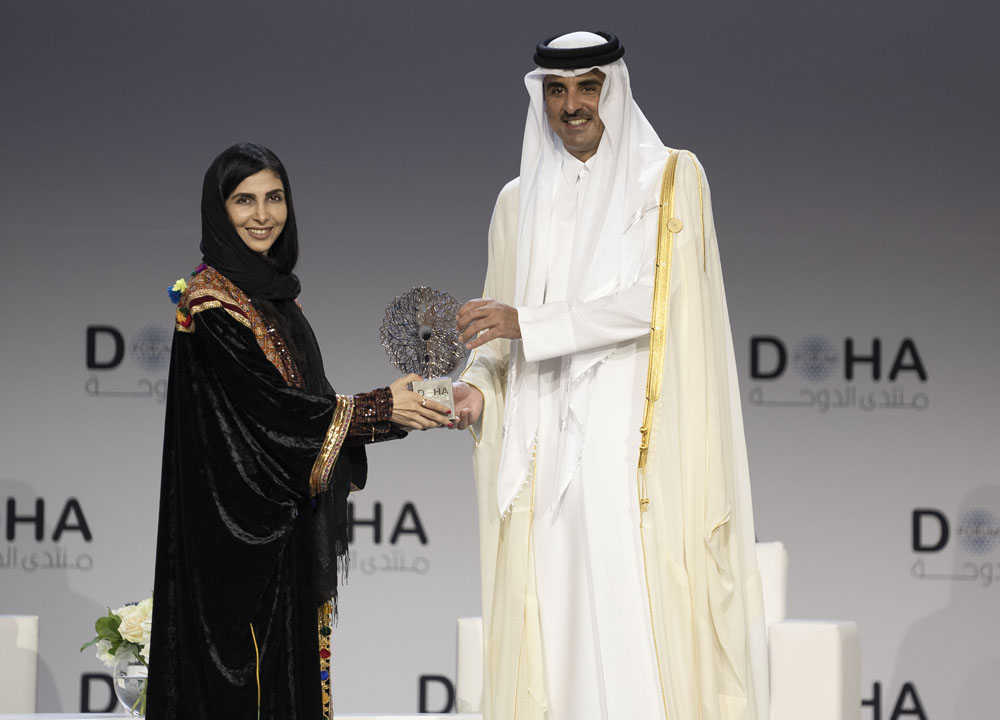 Amir H H Sheikh Tamim bin Hamad Al Thani honouring Roya Mahboob.