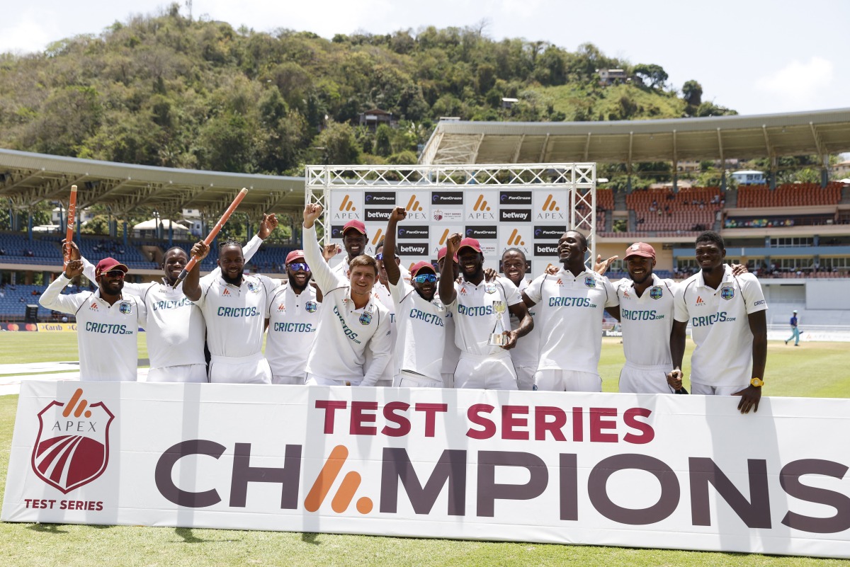 West Indies players celebrate with The Richards-Botham Trophy after winning the third test Action Images via Reuters/Jason Cairnduff
