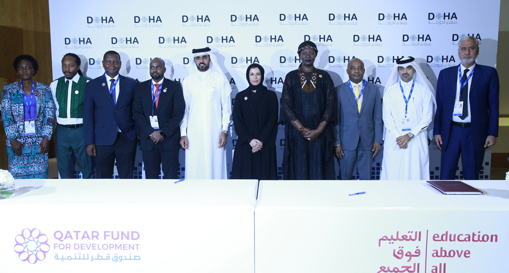 Minister of Education and Higher Education H E Buthaina bint Ali Al Jabr Al Nuaimi and Director-General of QFFD H E Khalifa Al Kuwari with other officials during the signing ceremony at Doha Forum. PIC: RAJAN VADAKKEMURIYIL