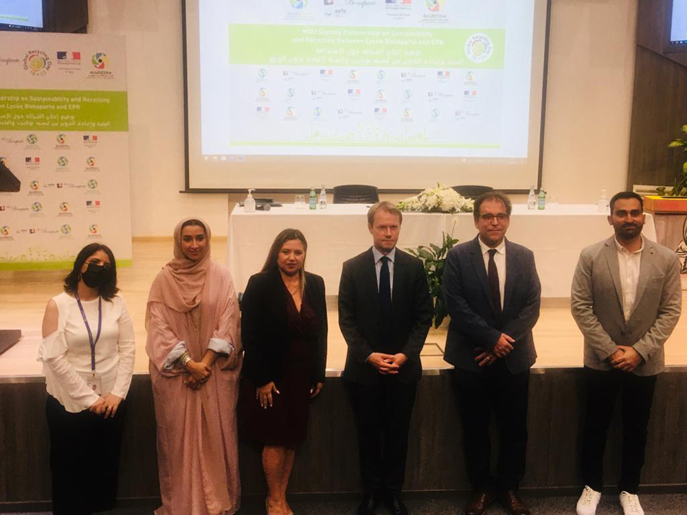 Ambassador of France to Qatar H E Jean-Baptiste Faivre and officials of Elite Paper Recycling and Lycee Bonaparte during the signing ceremony.