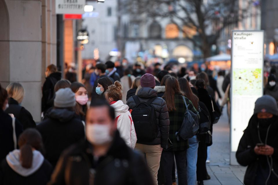 File Photo: People walk through the city center amid the spread of the coronavirus disease (COVID-19), before a lockdown on Wednesday, in Munich, Germany December 14, 2020. REUTERS/Andreas Gebert
