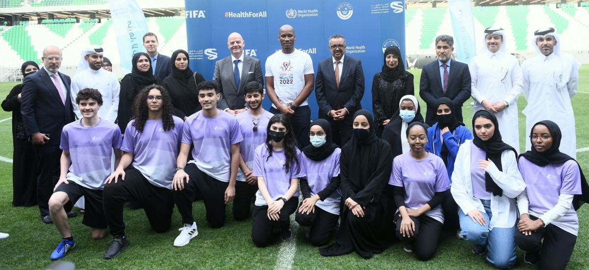 Minister of Public Health H E Dr Hanan Mohamed Al Kuwari, FIFA President Gianni Infantino, WHO Director-General, Dr Tedros Adhanom Ghebreyesus, WHO Goodwill Ambassador for Health and Sport, Didier Drogba, WHO Regional Director for the Eastern Mediterranean, Dr Ahmed Al Mandhari and Director at the Ministry of Public Health Dr. Mohamed bin Hamad Al Thani with other officials during an event following the first Steering Committee meeting of the ‘Healthy FIFA World Cup Qatar 2022 - Creating Legacy for Sport and Health’ at Education City Stadium, yesterday. Pic: RAJAN VADAKKEMURIYIL 
