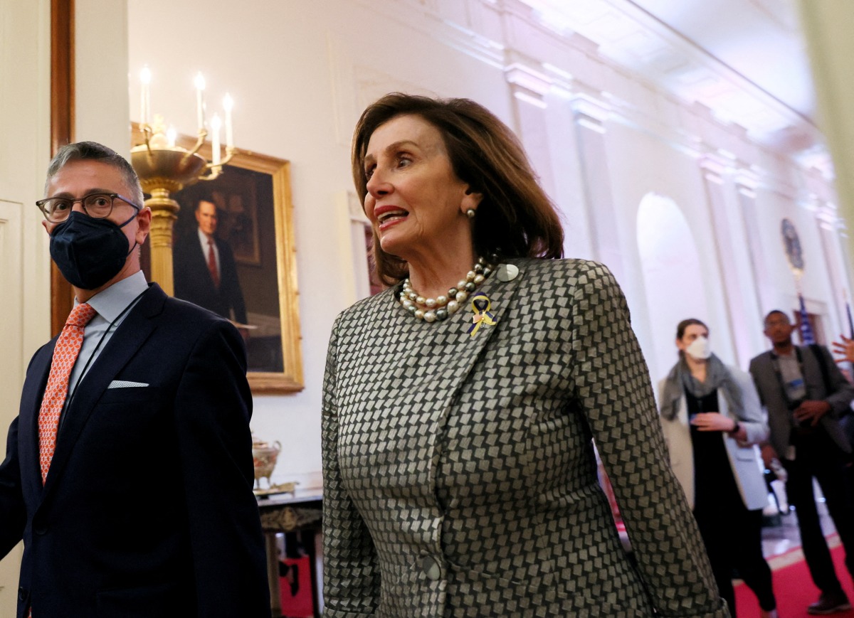 FILE PHOTO: U.S. House Speaker Nancy Pelosi (D-CA) arrives prior to President Joe Biden hosting an event on the Affordable Care Act, in the East Room at the White House in Washington, U.S., April 5, 2022. REUTERS/Leah Millis/File Photo
