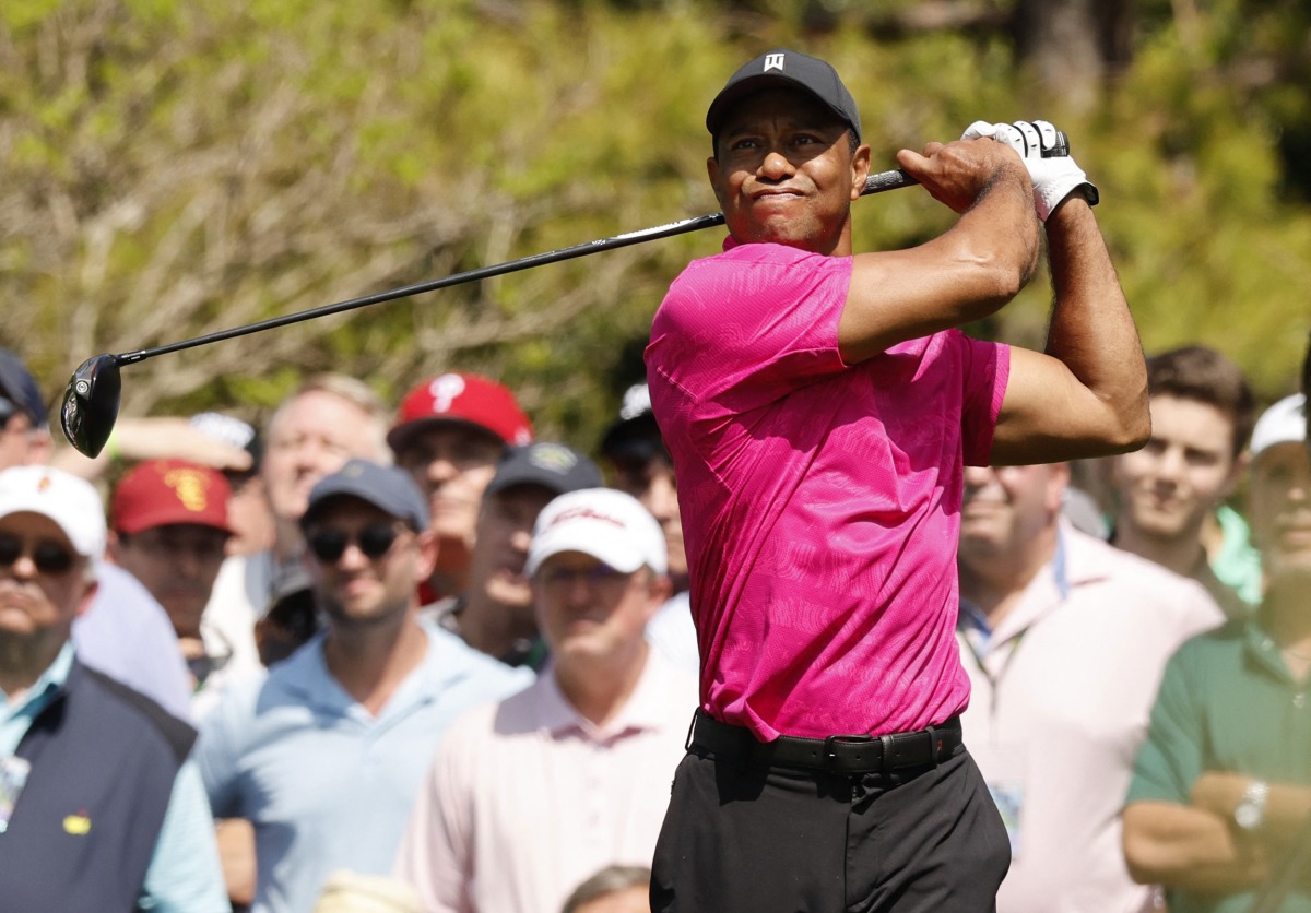 Tiger Woods of the U.S. tees off on the 4th during the first round REUTERS/Jonathan Ernst