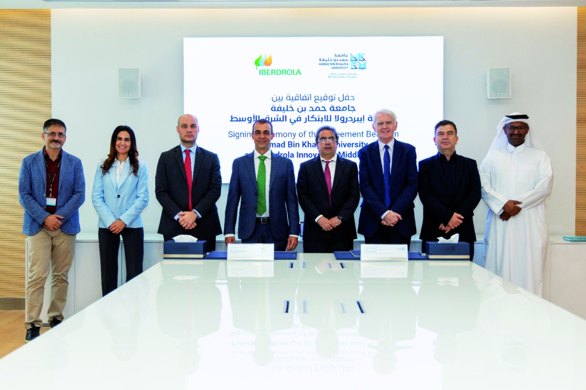 HBKU and Iberdrola Innovation Middle East officials at the agreement signing ceremony.