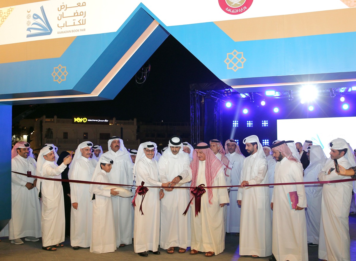 Minister of Culture H E Sheikh Abdulrahman bin Hamad Al Thani and Minister of State and Qatar National Library President H E Dr. Hamad bin Abdulaziz Al Kawari inaugurating the book fair at Souq Waqif yesterday. Pic: Salim Matramkot/The Peninsula