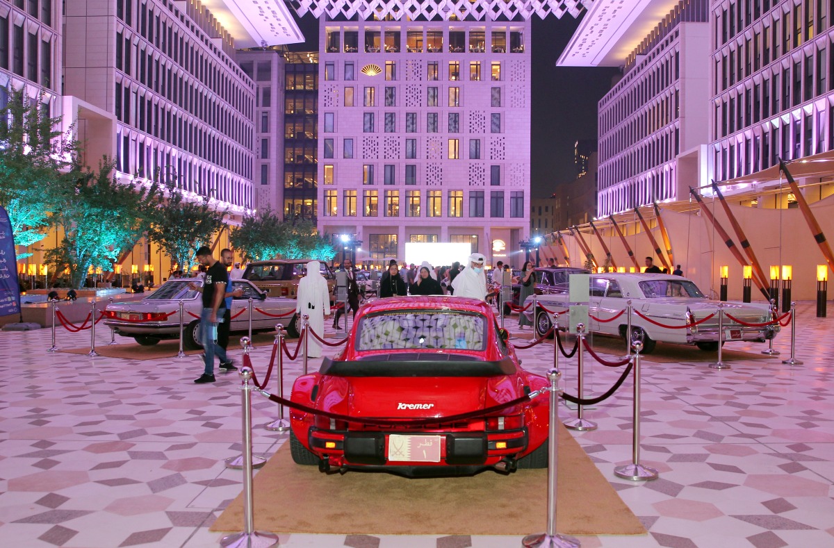 Visitors look at vintage cars on display at Barahat Msheireb Downtown Doha. Pic: Salim Matramkot/The Peninsula