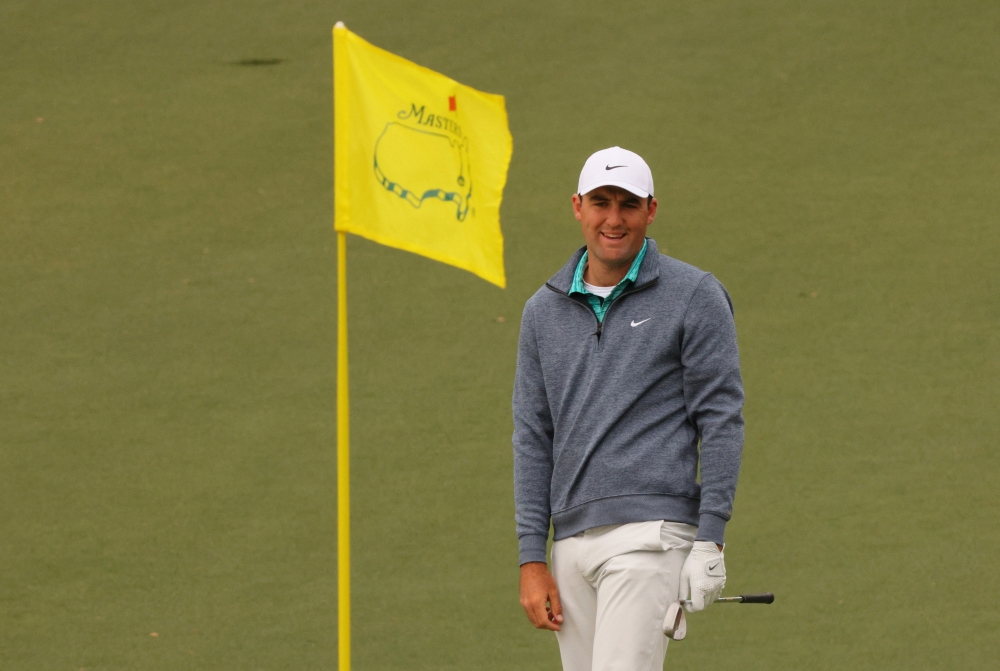 April 9, 2022 Scottie Scheffler of the U.S. reacts after chipping onto the 2nd green during the third round REUTERS/Brian Snyder