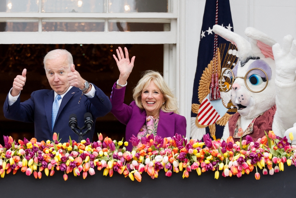 U.S. President Joe Biden and first lady Jill Biden gesture during the annual Easter Egg Roll at the White House in Washington, U.S. April 18, 2022. REUTERS/Jonathan Ernst