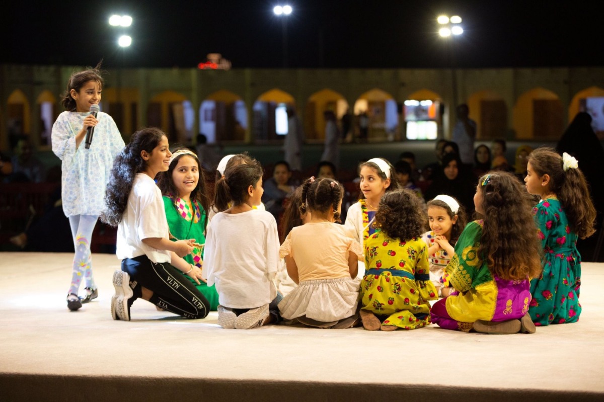 Children enjoy as they play traditional games at Katara.