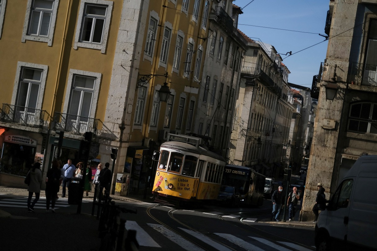 FILE PHOTO: A tram is seen in downtown Lisbon, Portugal, October 28, 2021. REUTERS/Pedro Nunes/File Photo
