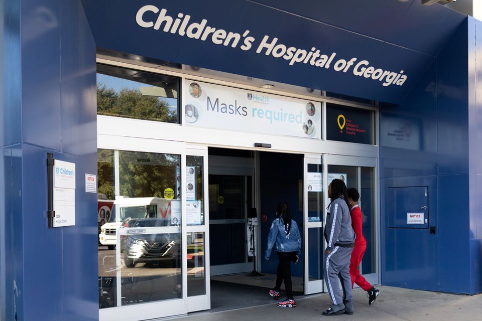 People walk into the Children's Hospital of Georgia in Augusta, Georgia, U.S., January 14, 2022. REUTERS/Hannah Beier

