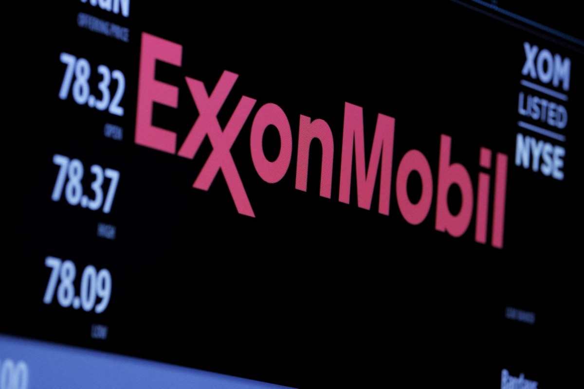 FILE PHOTO: The logo of Exxon Mobil Corporation is shown on a monitor above the floor of the New York Stock Exchange in New York, December 30, 2015. REUTERS/Lucas Jackson/File Photo
