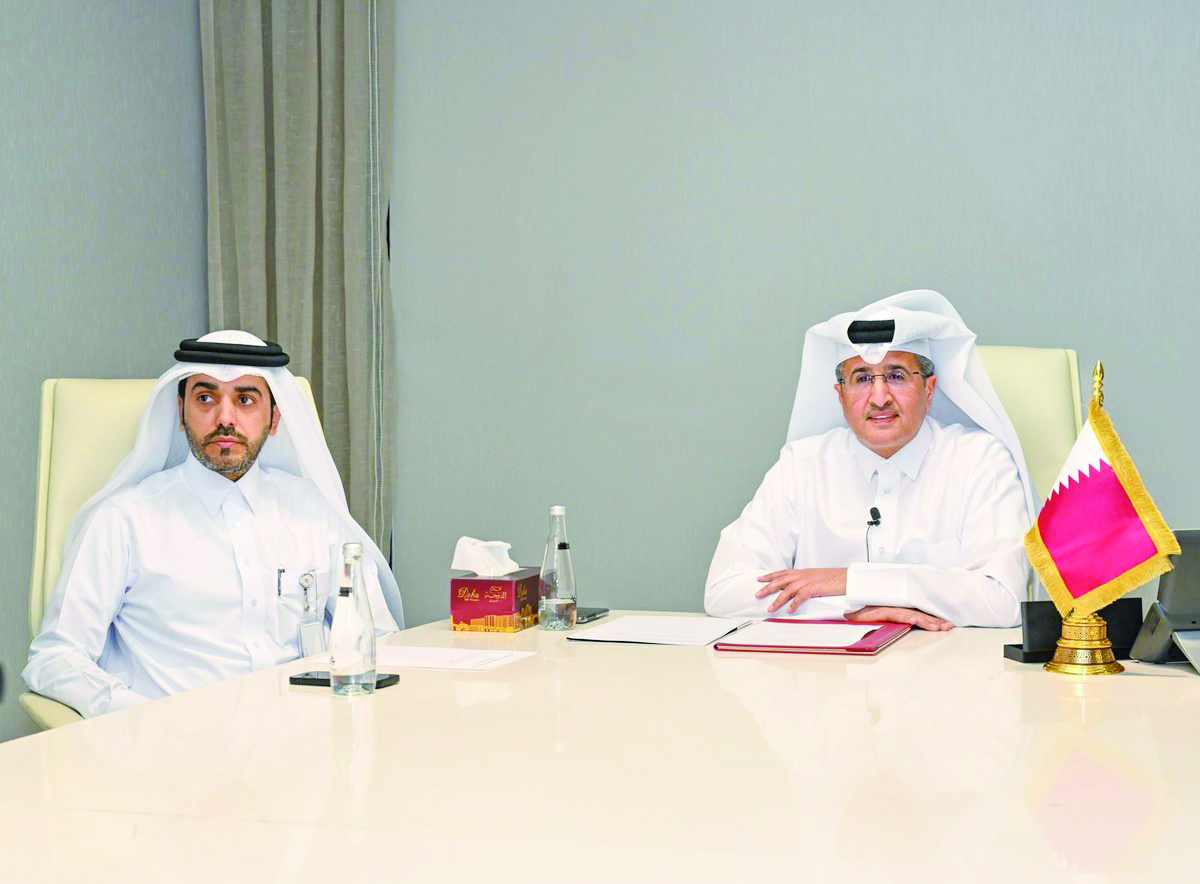 Mohammed Faleh Al Hajri (right) in charge of Qatar Civil Aviation Authority (QCAA) with another official during the signing of the MoU.