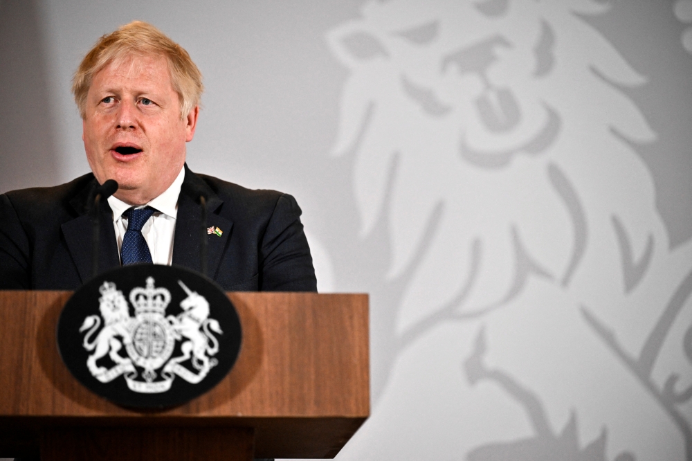 British Prime Minister Boris Johnson speaks during a news conference in New Delhi, India, April 22, 2022. Ben Stansall/Pool via REUTERS