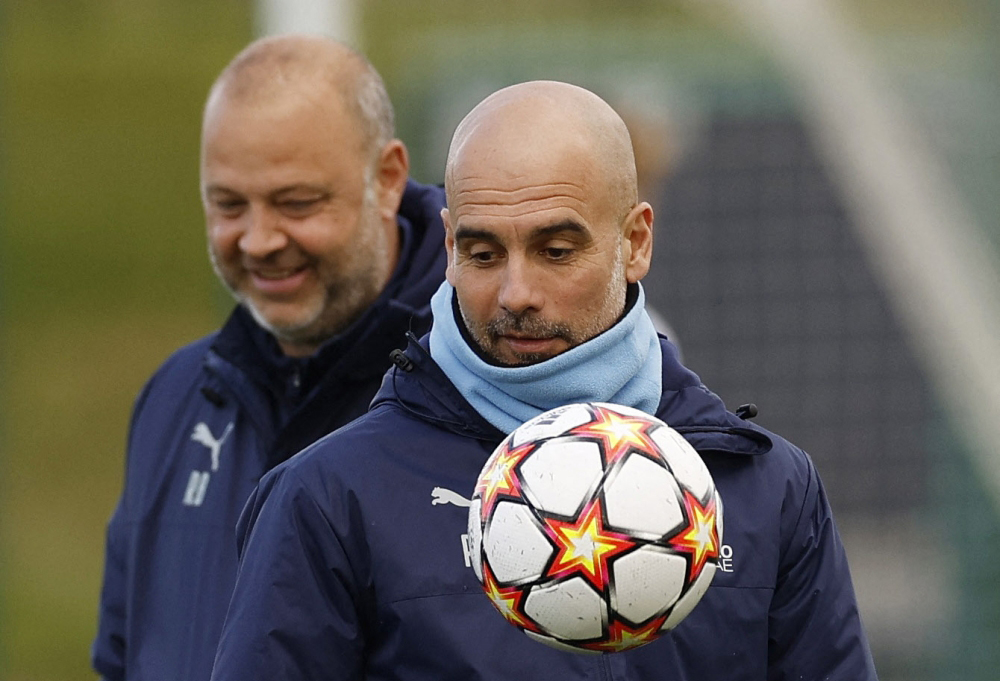 Manchester City manager Pep Guardiola and assistant coach Rodolfo Borrell during training Action Images via Reuters/Jason Cairnduff