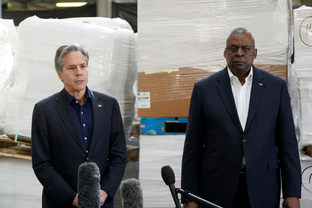 U.S. Defense Secretary Lloyd Austin and U.S. Secretary of State Antony Blinken speak with reporters after returning from their trip to Kyiv and meeting with Ukrainian President Volodymyr Zelenskiy, near the Ukraine border, in Poland, April 25, 2022. Alex Brandon/Pool via REUTERS