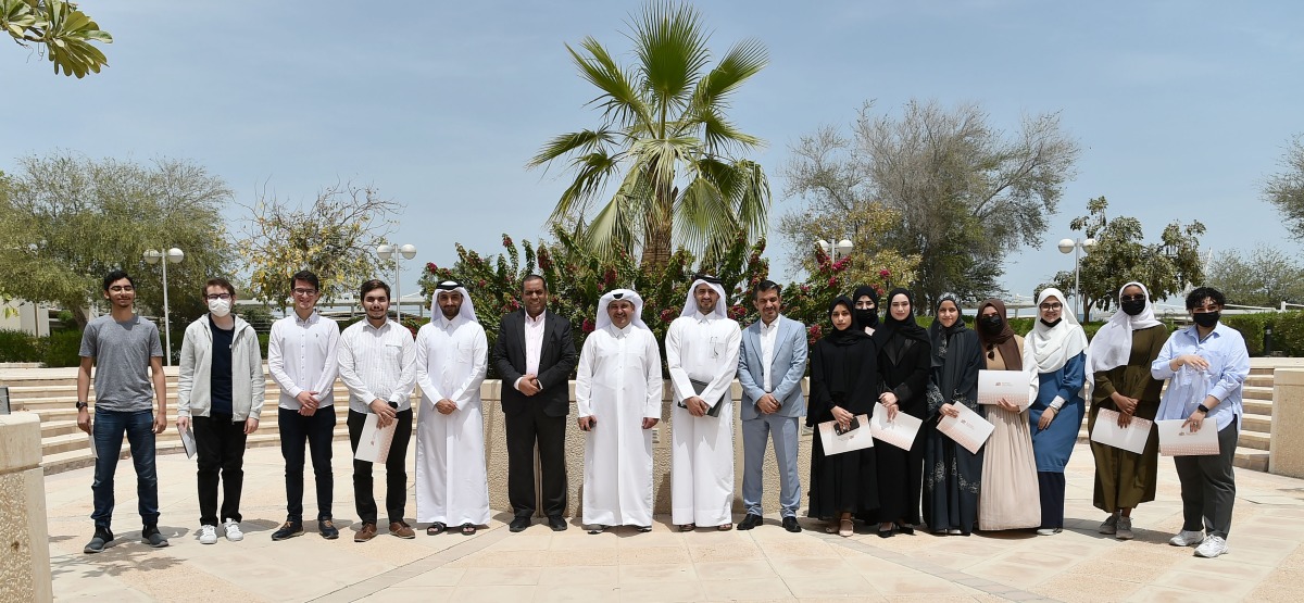 Officials and students during the event.