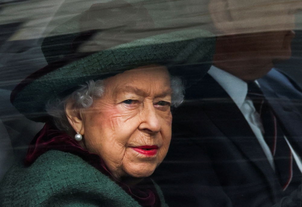 Britain's Queen Elizabeth and Prince Andrew, Duke of York, arrive for the service of thanksgiving for late Prince Philip, Duke of Edinburgh, at Westminster Abbey, in London, Britain, March 29, 2022. REUTERS/Tom Nicholson/File Photo