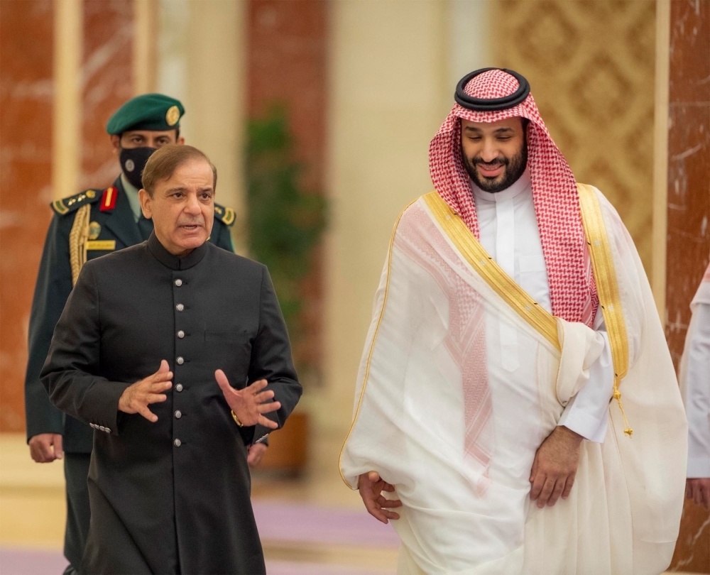 Saudi Crown Prince Mohammed bin Salman meets Pakistan's Prime Minister Shehbaz Sharif upon his arrival in Jeddah, Saudi Arabia, April 29, 2022. 