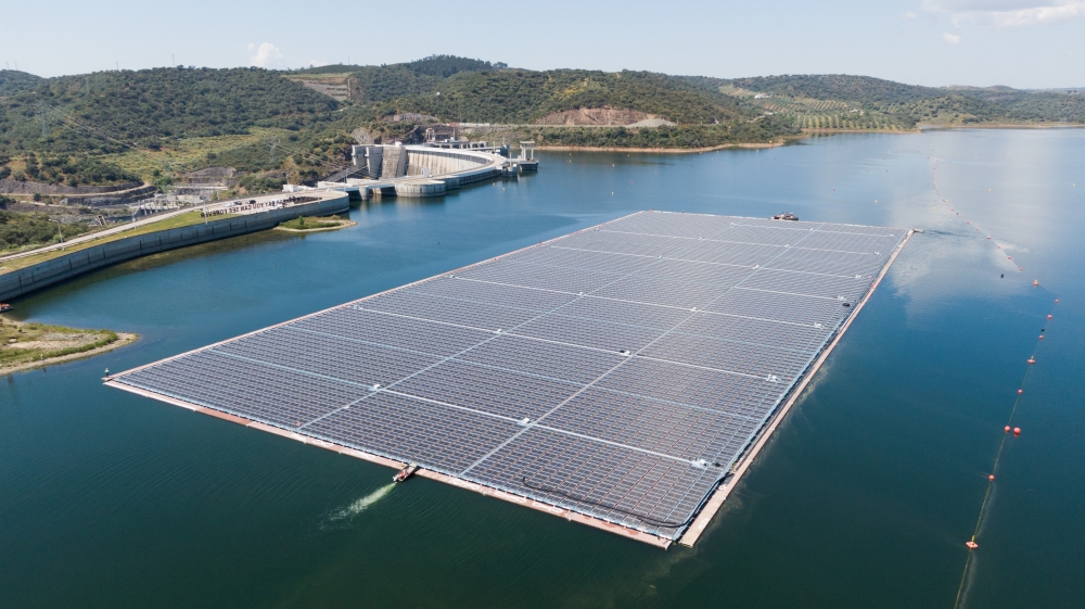 Aerial view of EDP's (Energias de Portugal) largest floating solar farm on a dam in Europe, on the surface of Alqueva dam, in Moura, Portugal, May 5, 2022. Picture taken May 5, 2022. Picture taken with a drone. REUTERS/Miguel Pereira