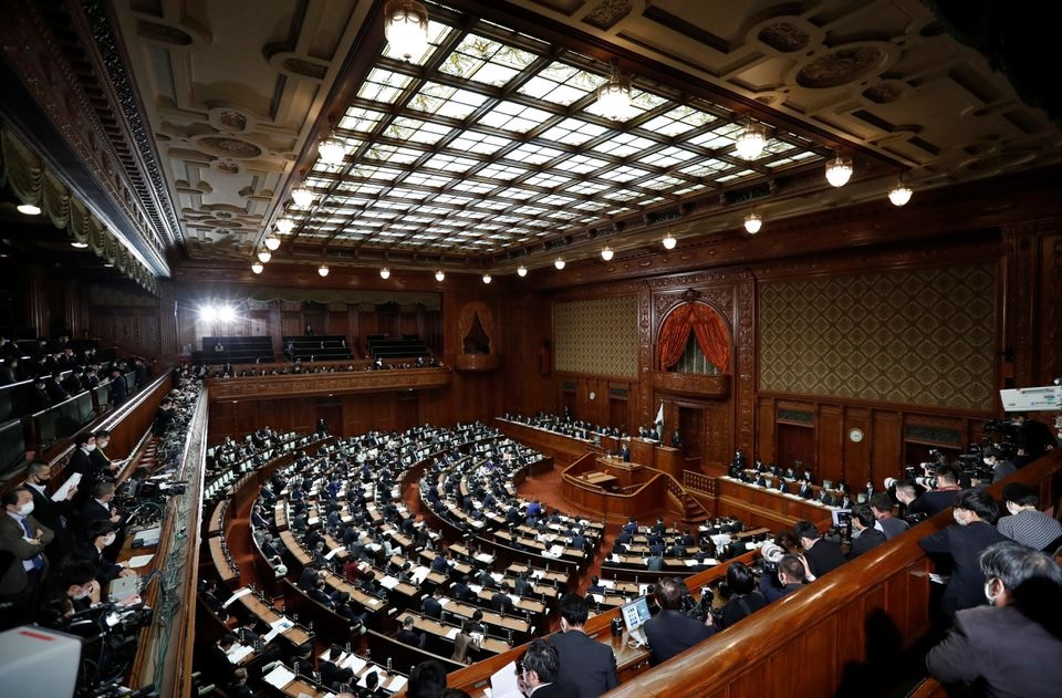 Empty seats are seen as lawmakers practice social distancing, during Japan's Prime Minister Yoshihide Suga's policy speech at the opening of the Lower House parliamentary session in Tokyo, Japan January 18, 2021. REUTERS/Issei Kato

