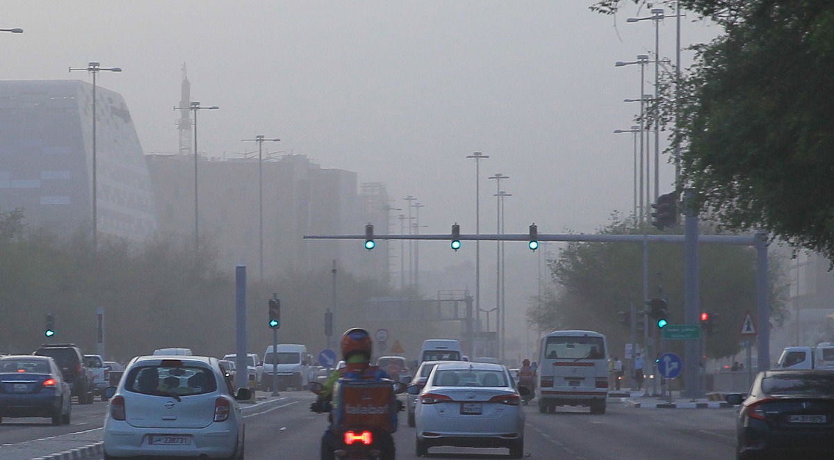 Motorists driving through the dust storm, which covered the entire Gulf region, in Doha yesterday. Pic:Salim Matramkot/the Peninsula