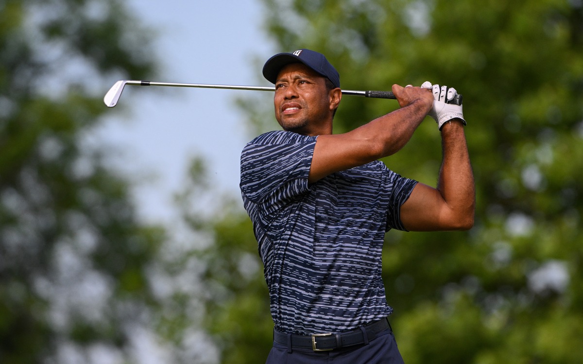 Tiger Woods plays his shot on the 14th tee during the first round of the PGA Championship golf tournament. Mandatory Credit: Orlando Ramirez-USA TODAY Sports
