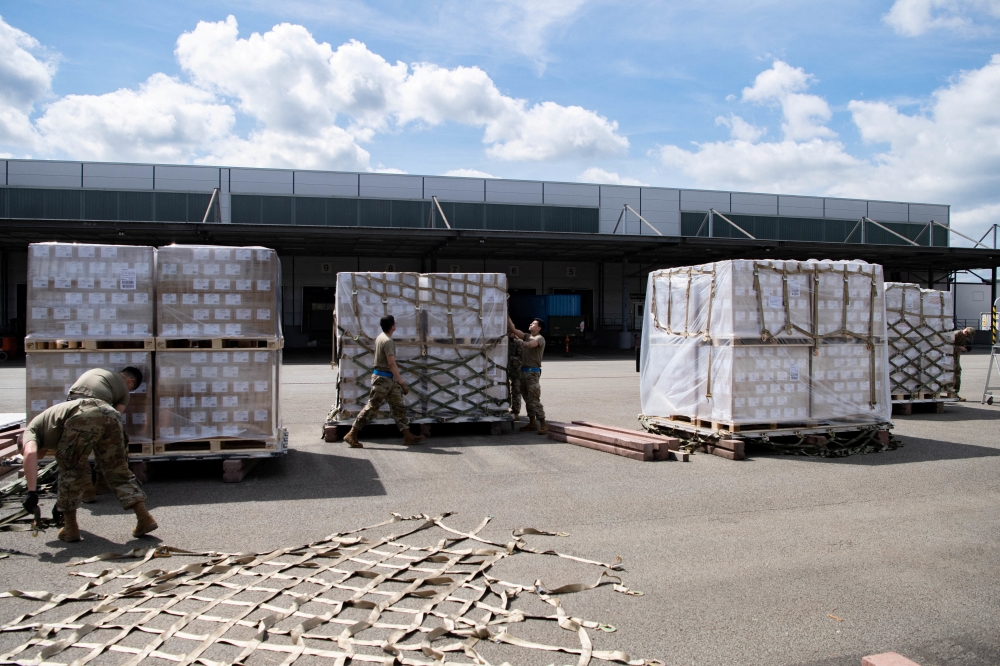 U.S. Air Force Airmen build pallets of infant formula being shipped from Europe to the United States during Operation Fly Formula at Ramstein Air Base, Germany, May 21, 2022. Picture taken May 21, 2022. U.S. 