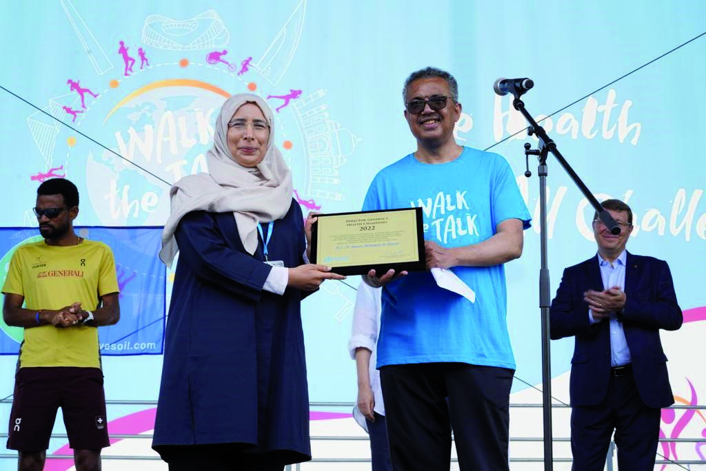 Minister of Public Health H E Dr. Hanan Mohamed Al Kuwari receiving the award from WHO Director-General Dr Tedros Adhanom Ghebreyesus in Geneva, yesterday. 