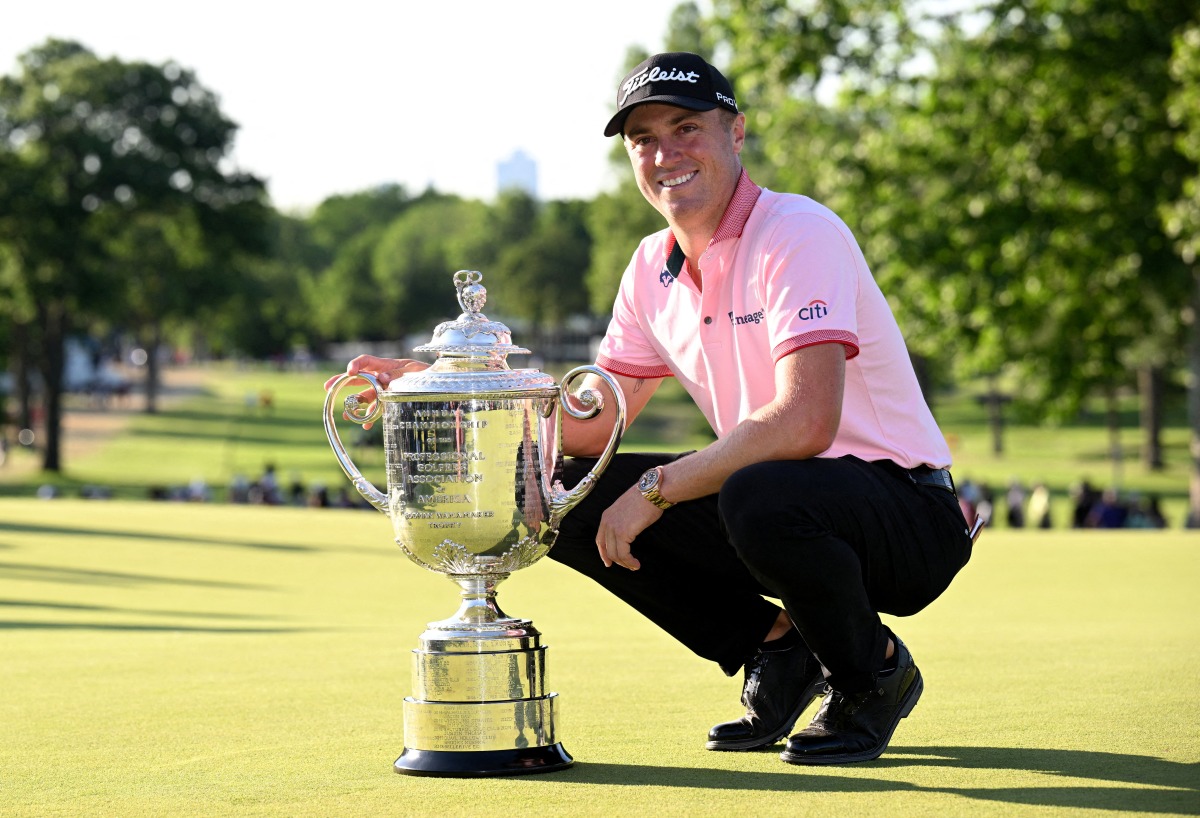 Justin Thomas poses with the Wanamaker trophy after winning the PGA Championship golf tournament at Southern Hills Country Club. Mandatory Credit: Orlando Ramirez-USA TODAY Sports