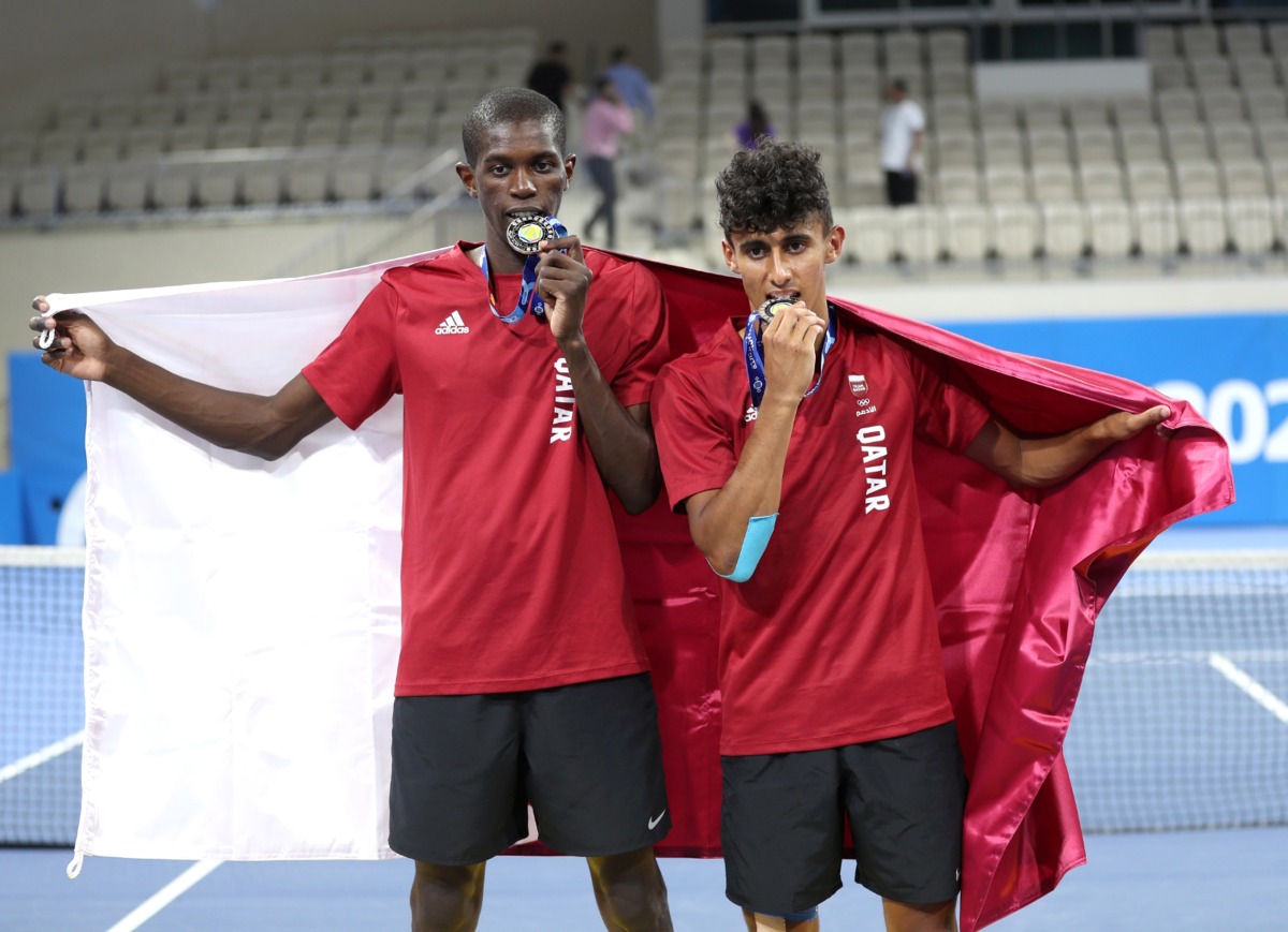 Qatar’s Mubarak Shannan and Rashed Nawaf celebrate after winning the silver medal at the third GCC Games.