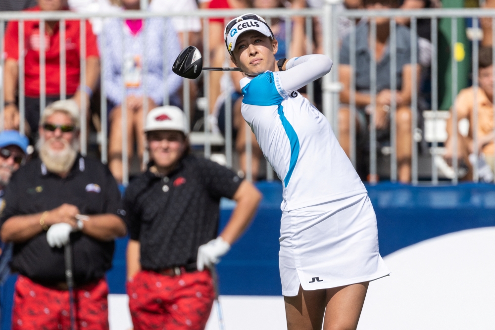 Nelly Korda plays her shot off the first tee during the first round of the PNC Championship golf tournament at Grande Lakes Orlando Course. Mandatory Credit: Jeremy Reper-USA TODAY Sports/File Photo
