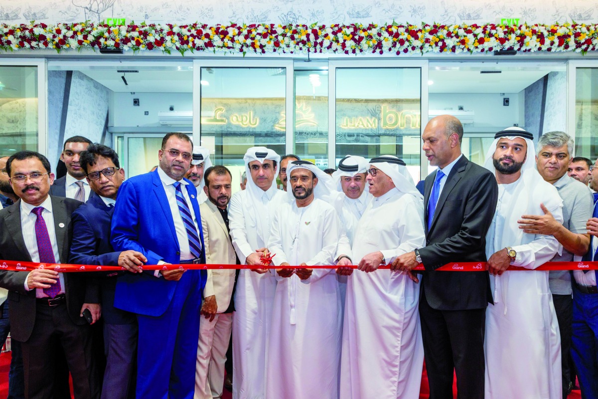 Assistant Undersecretary for Labour Affairs at the Ministry of Labour Mohammed Hassan Al Obaidly with other officials inaugurating the Grand Mall Hypermarket in Mekaines.