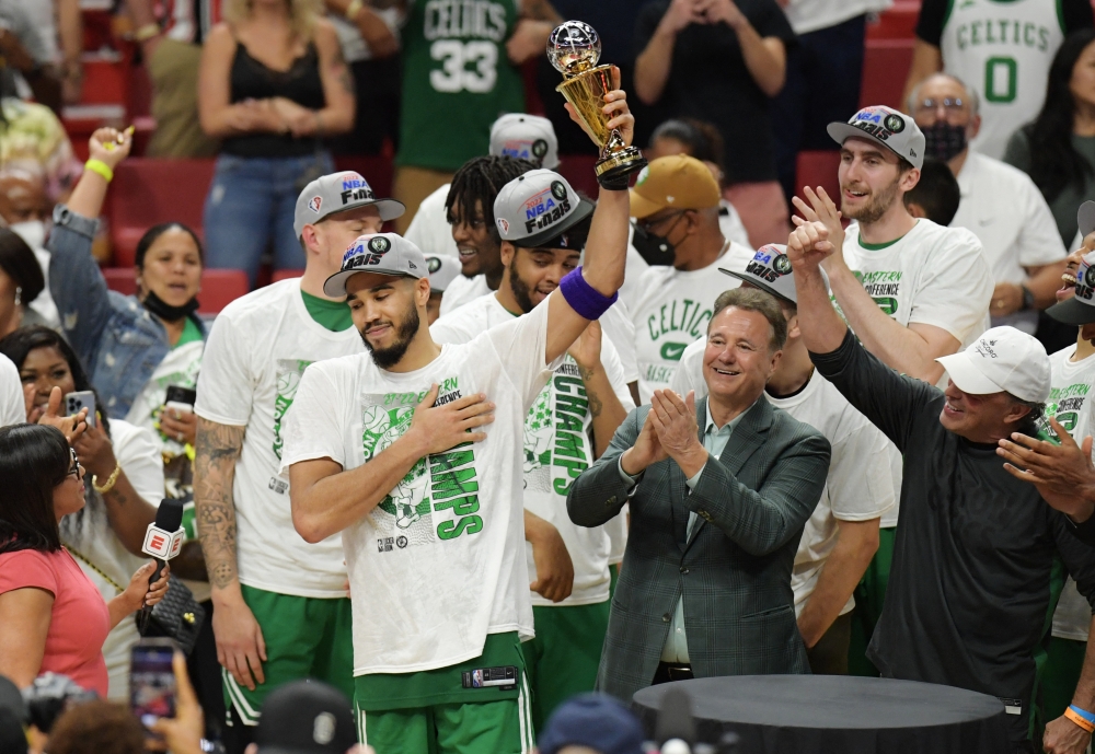 Boston Celtics forward Jayson Tatum (0) reacts after winning the Larry Bird Eastern Conference Finals MVP trophy after game seven of the 2022 eastern conference finals at FTX Arena. Jim Rassol
