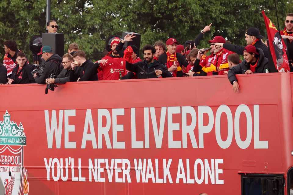 Liverpool's Mohamed Salah and teammates on board an open top bus during the victory parade REUTERS/Phil Noble

