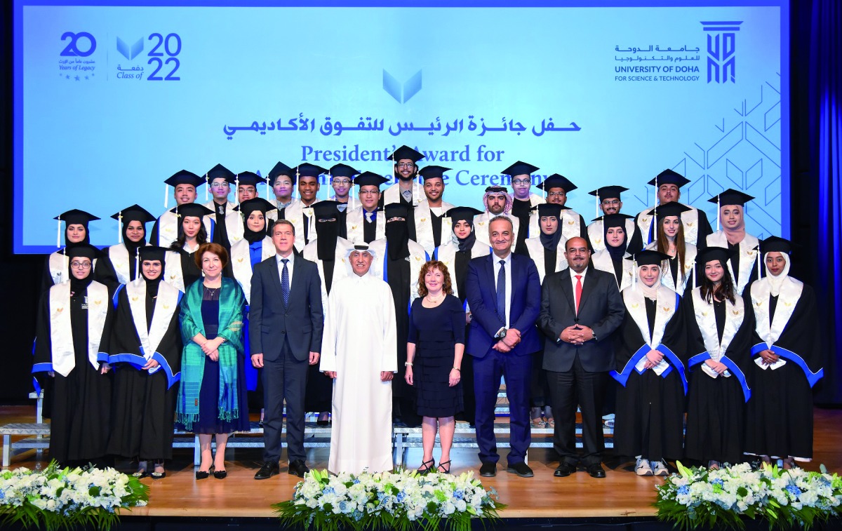 University of Doha for Science and Technology’s highest-achieving graduates of the Class of 2022 with the officials.