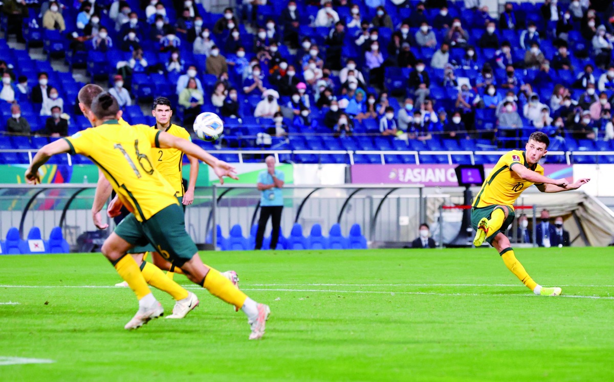 Australia’s Ajdin Hrustic shoots to score during an earlier FIFA World Cup Qatar 2022 Asia Qualifier against Japan in Saitama, Japan in this October 12, 2021 file photo.