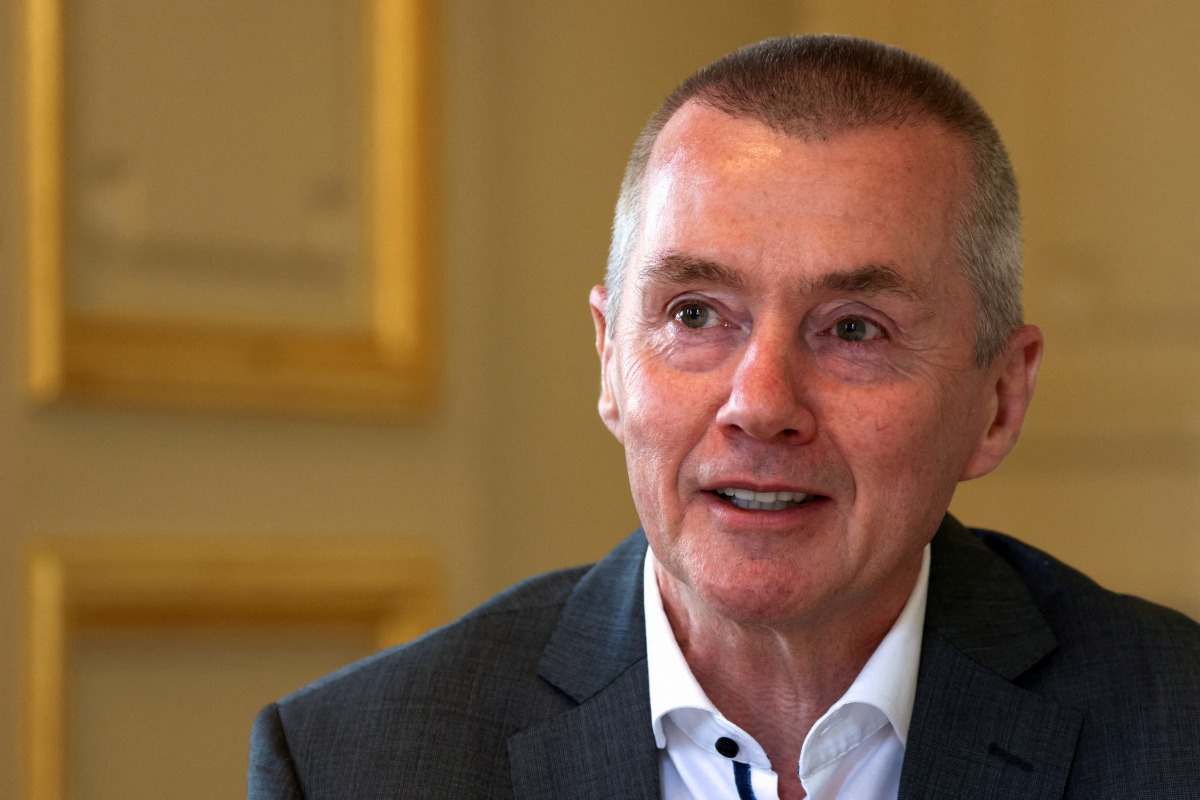 FILE PHOTO: Willie Walsh, Director General of the International Air Transport Association (IATA) speaks to journalists in Paris, France, May 31, 2022. REUTERS/Kevin Coombs/File Photo
