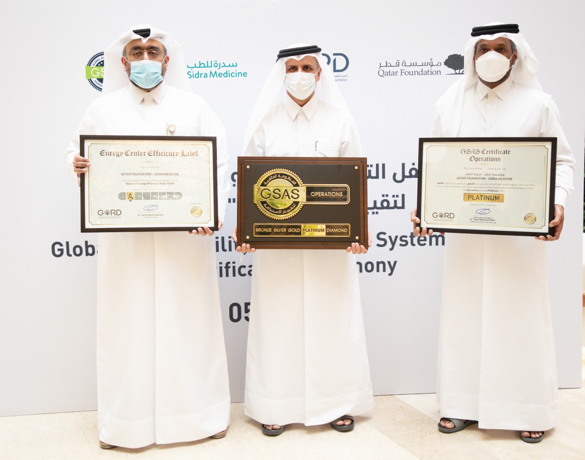 Officials during the ceremony to hand over the certificate.