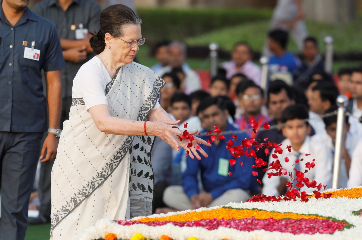 FILE PHOTO: India's Congress Party chief Sonia Gandhi pays homage at the Mahatma Gandhi memorial on the 150th birth anniversary of Gandhi at Rajghat in New Delhi, India October 2, 2019. REUTERS/Adnan Abidi/File Photo
