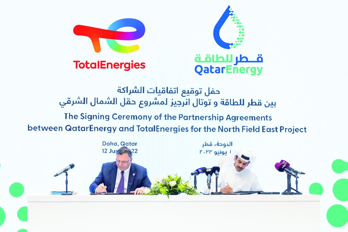 Minister of State for Energy Affairs, the President and CEO of QatarEnergy H E Saad Sherida Al Kaabi, and Chairman of the Board and Chief Executive Officer of TotalEnergies Patrick Pouyanné, signing the partnership agreements in Doha, yesterday.  