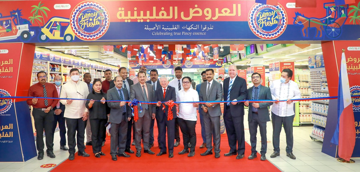 The Ambassador of the Philippines to Qatar H E Alan L Timbayan (middle), with Regional Director of Lulu M O Shaijan (fifth left) and other officials, inaugurating the ‘Pinoy Fiesta’ at the D-Ring Road branch of Lulu Hypermarkets yesterday. PIC: Salim Matramkot/The Peninsula