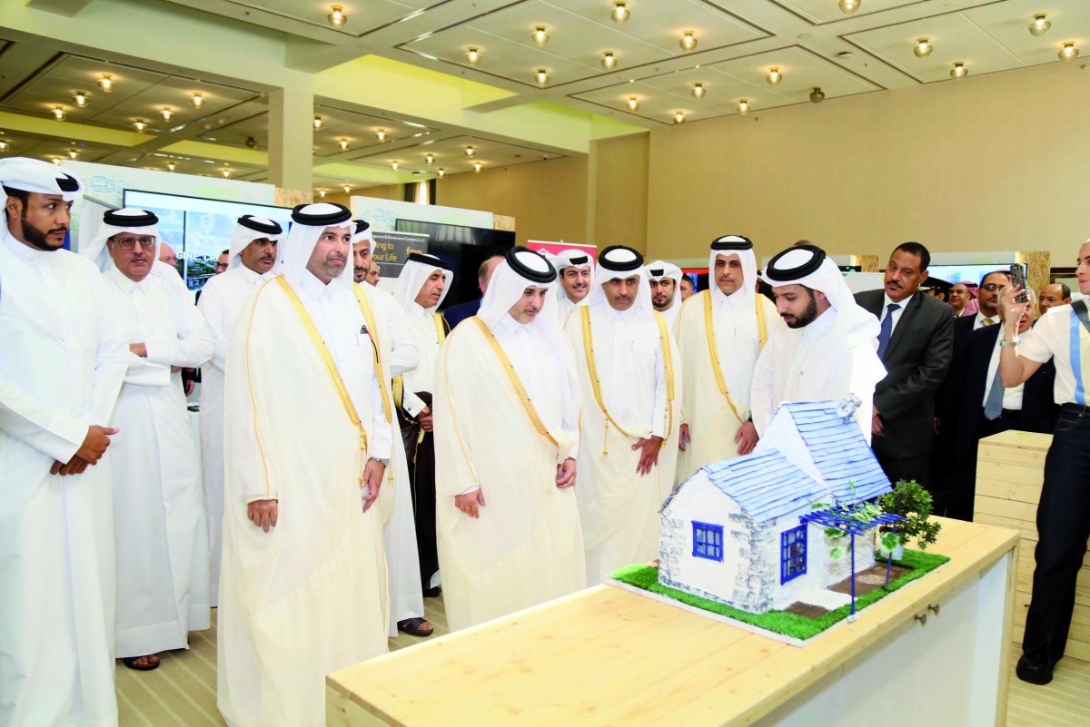 Minister of Environment and Climate Change H E Sheikh Dr. Faleh bin Nasser bin Ahmed bin Ali Al Thani  (left), Minister of Municipality H E Dr. Abdullah bin Abdulaziz bin Turki Al Subaie (second left), and President of Kahramaa Eng Essa bin Hilal Al Kuwari (third left), with other officials touring the exhibition on the sidelines of 2nd Waste Management Conference at Sheraton Hotel, yesterday.  Pic: Amr Diab